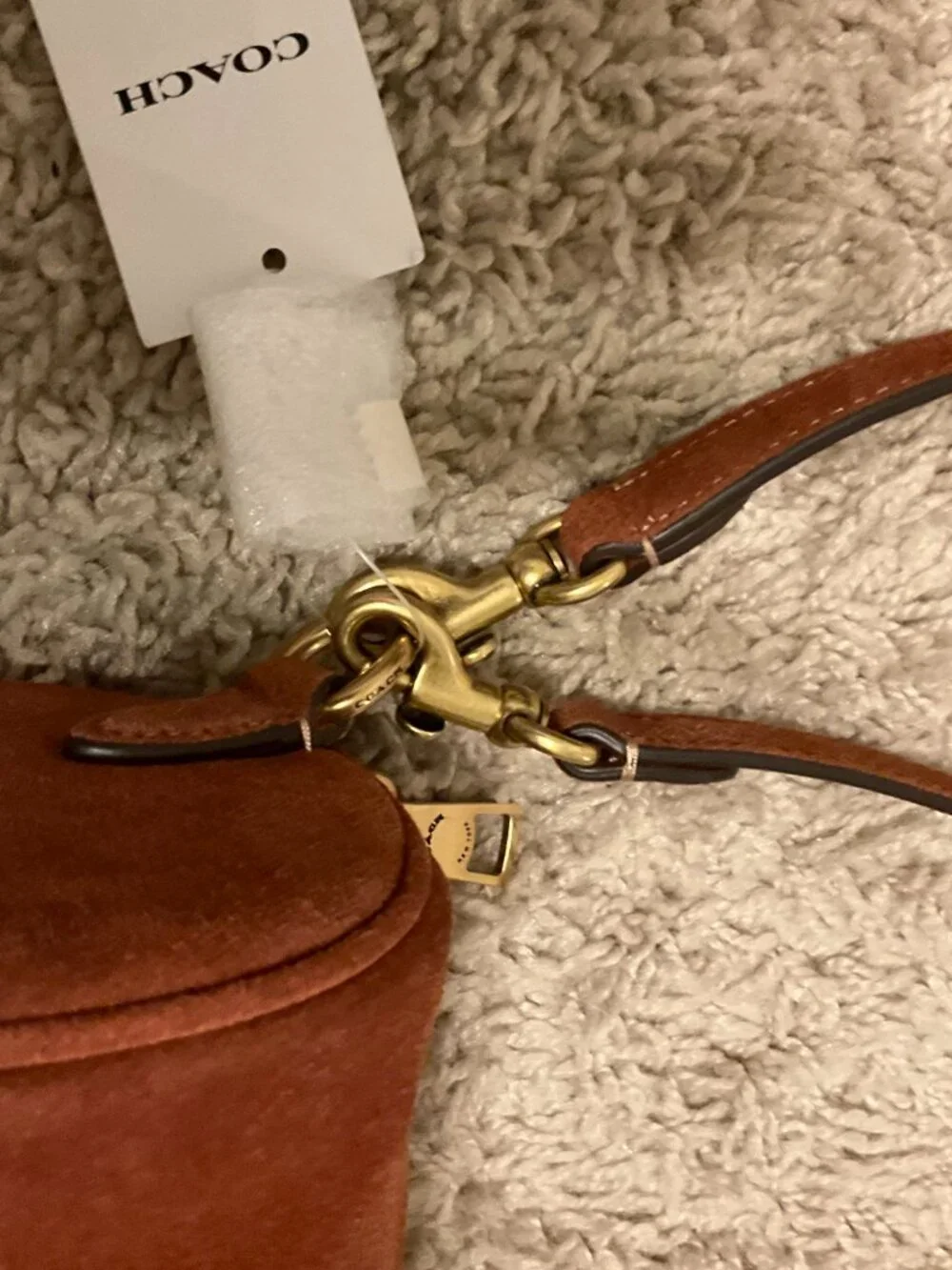 COACH barrel bag. brass/clay. CDy81.